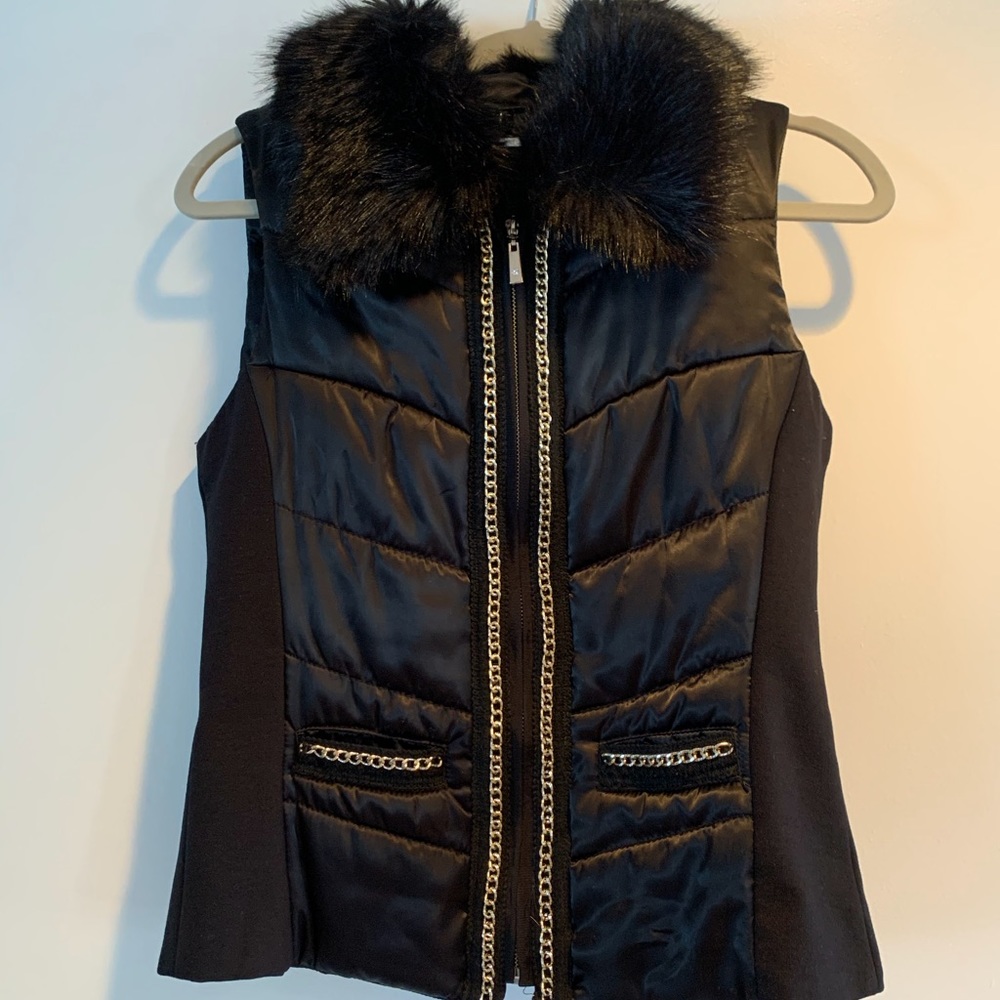 Black vest with black fur collar
